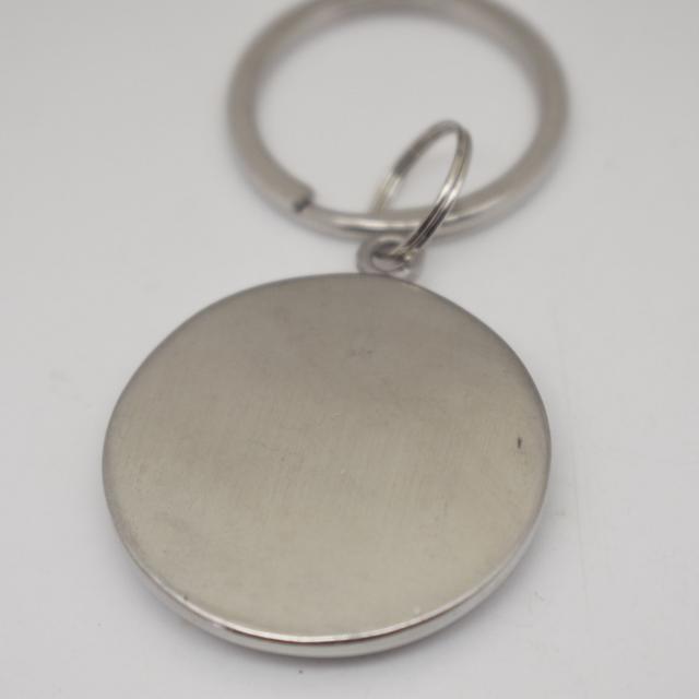 follow your dreams compass keychain backside.jpg